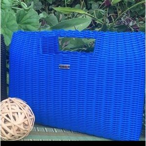 New without tag recycled plastic craft clutch